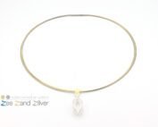 Een zilveren zeppel hanger met elementje waarop een plaatje goud is gesoldeerd