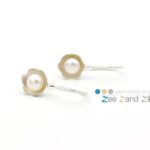Zilveren oorbellen 'buttercups' met witte zoetwaterparels