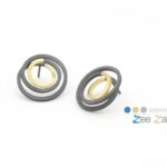 Oorstekers 'swirl' van zilver en goud