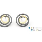Oorstekers 'swirl' van zilver en goud